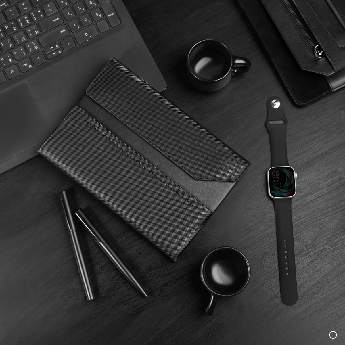two black cups / notebook /pen set