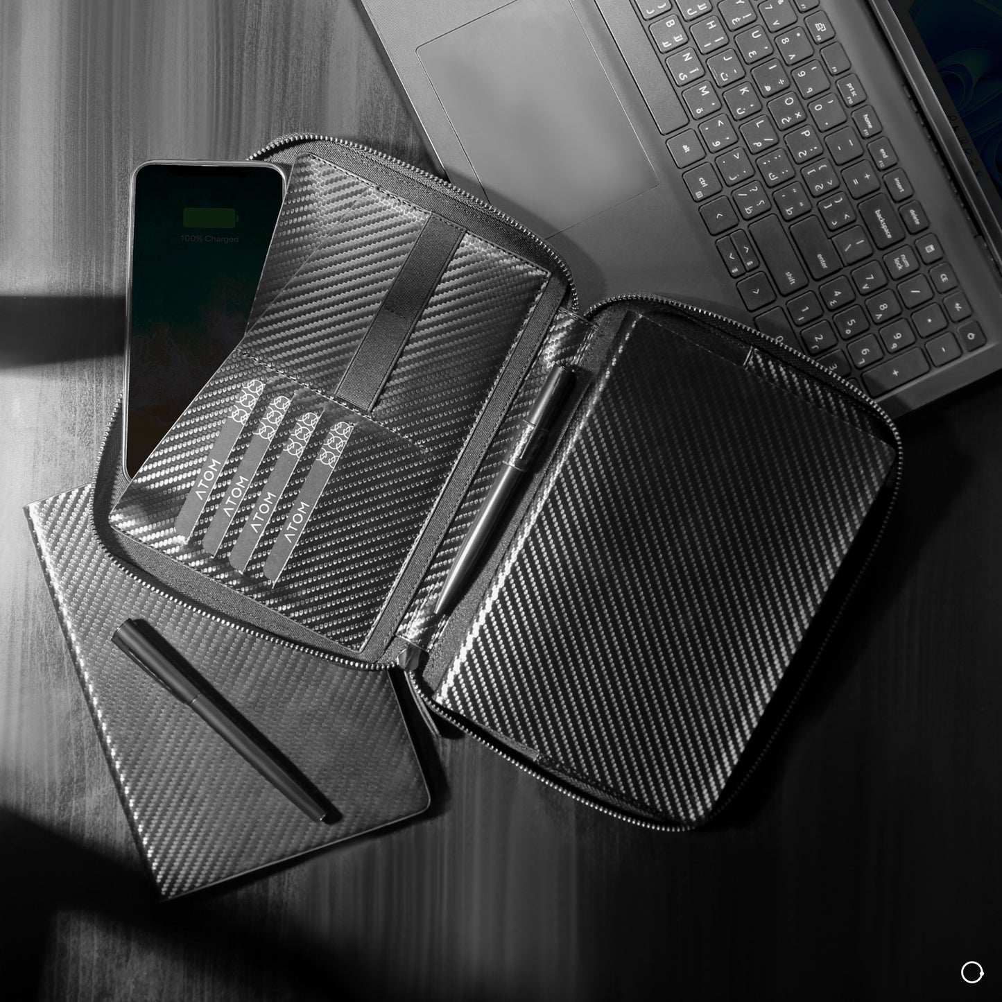 Black shiny Synthetic organizer with dimensions 23cm×16 cm, it has 1 front pocket,2 Large side pockets,5 Card pockets,2 Elastic pockets,1 Pen holder with zipper lock