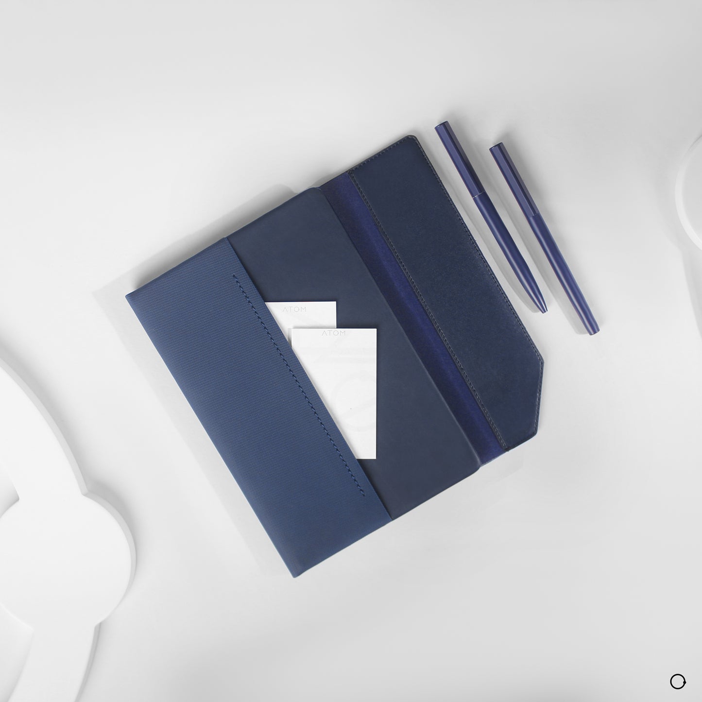 navy notebook with Creamy papers